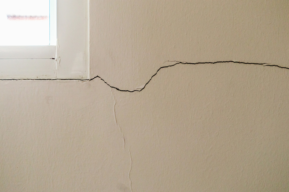 A crack radiating from a window frame